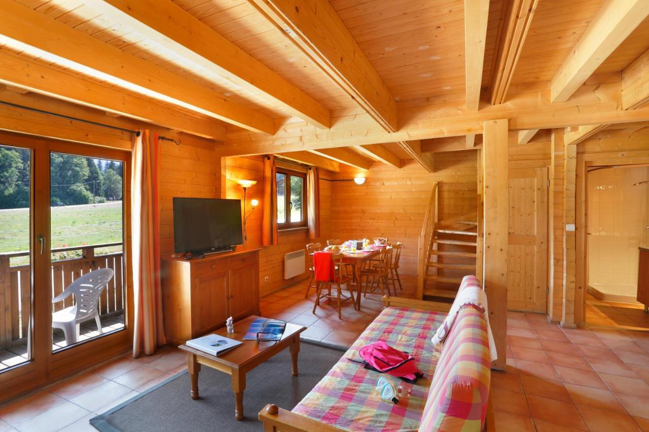 Residence Nemea Les Chalets Du Bois De Champelle Morillon Exterior photo